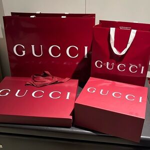 This never sold - Gucci - boxes and bags with ribbon and tissue
